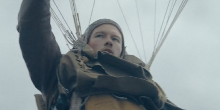 Callum Turner as Major John Egan in a parachute Masters of the Air-2