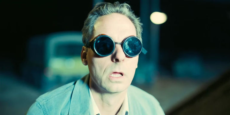 Guy watching the Trinity nuclear test explosion in Oppenheimer