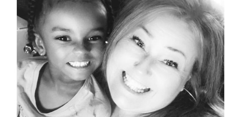 Teen Mom star Kailyn Lowry's nanny Natalie smiles and poses with a little girl. 
