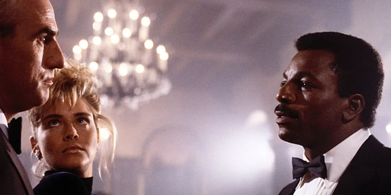 Carl Weathers talking to Craig T. Nelson and Sharon Stone in Action Jackson