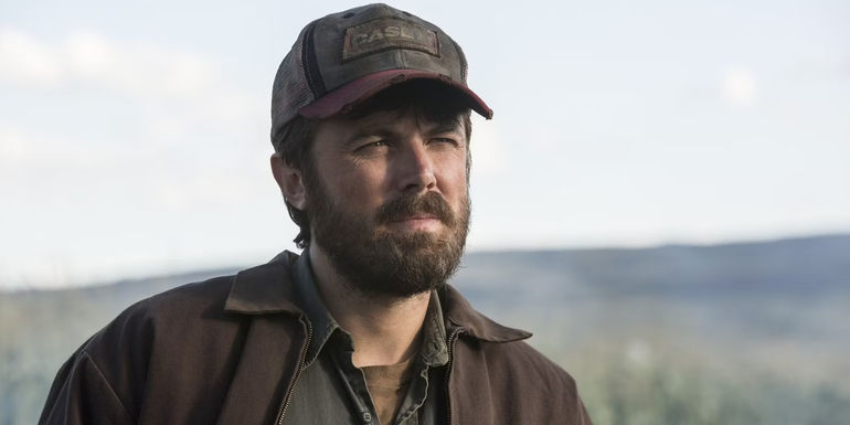 Casey Affleck in a corn field in Interstellar