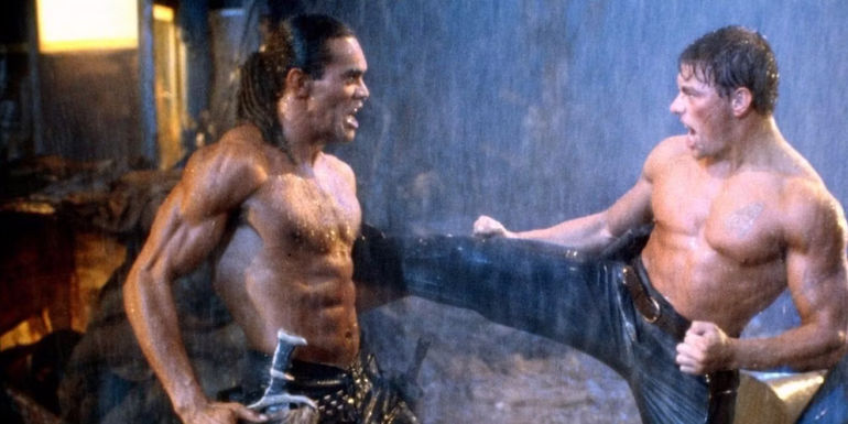 Jean-Claude Van Damme kicks an enemy in Cyborg.