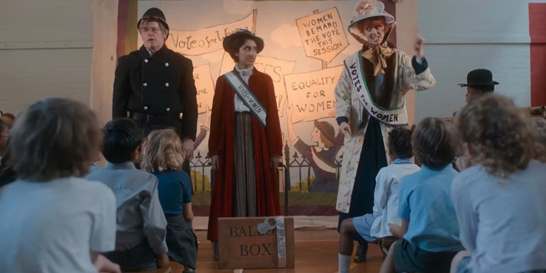 Emma performing in a theater production. 