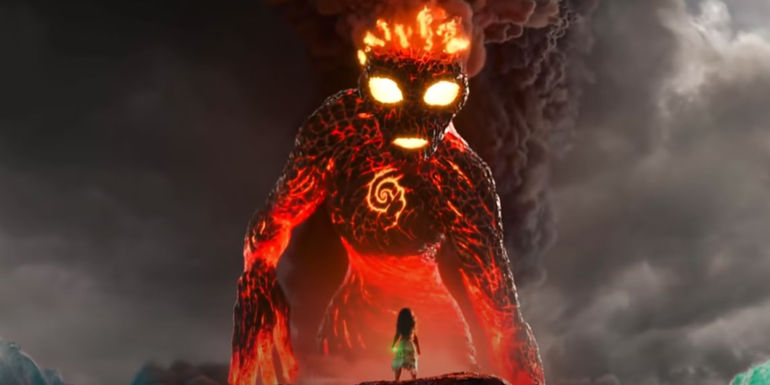 Moana holding the heart while TeKa burns in front of her in Moana