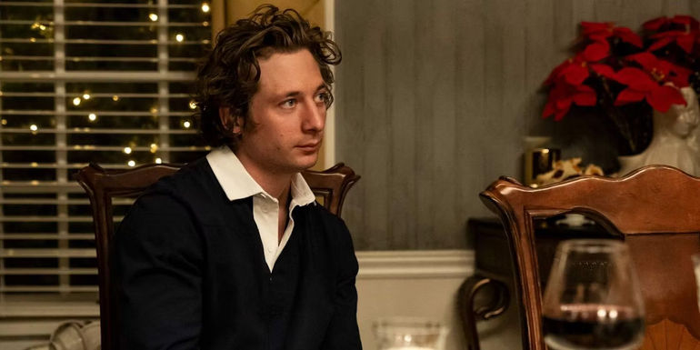 Carmy Berzatto (Jeremy Allen White) sitting at the table for Christmas dinner in The Bear season 2, episode 6, 