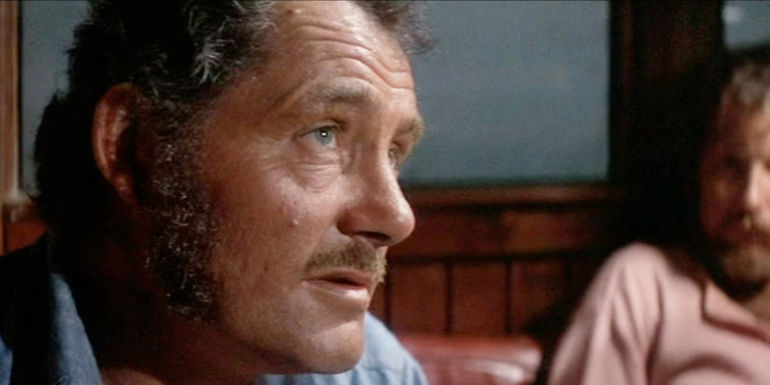 Quint giving a speech in Jaws