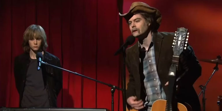 Bill Hader as a country music star singing next to his son (Justin Bieber) in Song For Daddy in SNL.