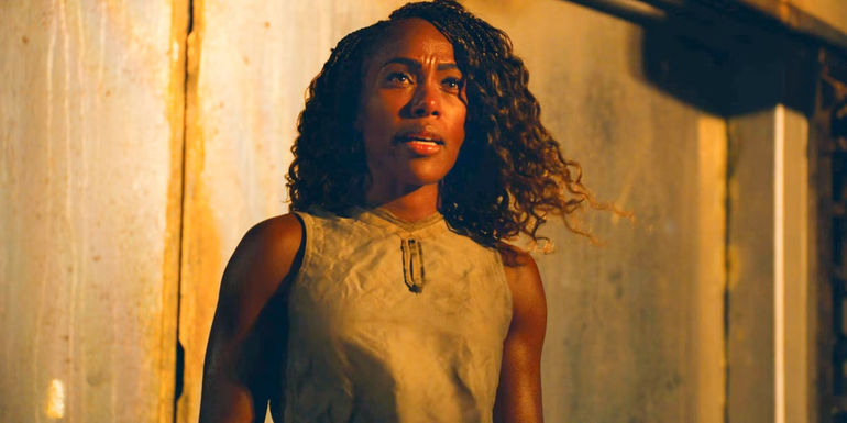 DaWanda Wise standing looking concerned in Jurassic World Dominion