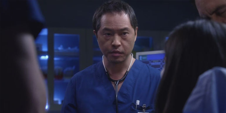 Topher (Ken Leung) staring intensely in The Night Shift.
