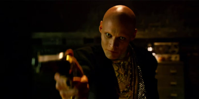 Caliban pointing a gun in x-men apocalypse