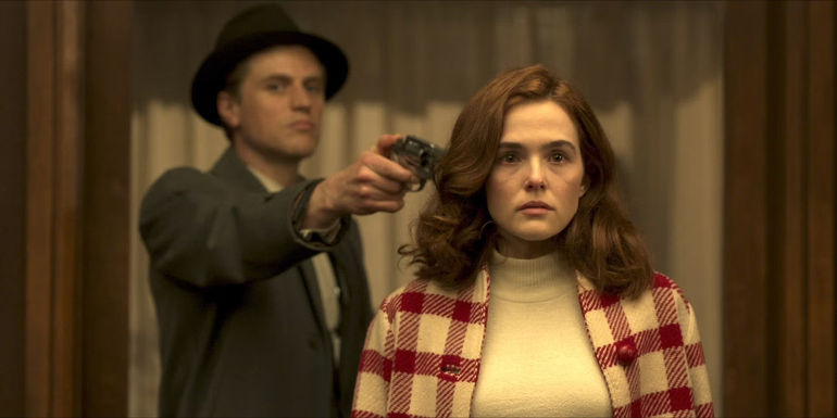 Francis with gun to Mable's head in The Outfit