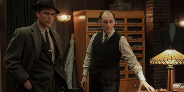 Leonard and Francis looking confused in The Outfit