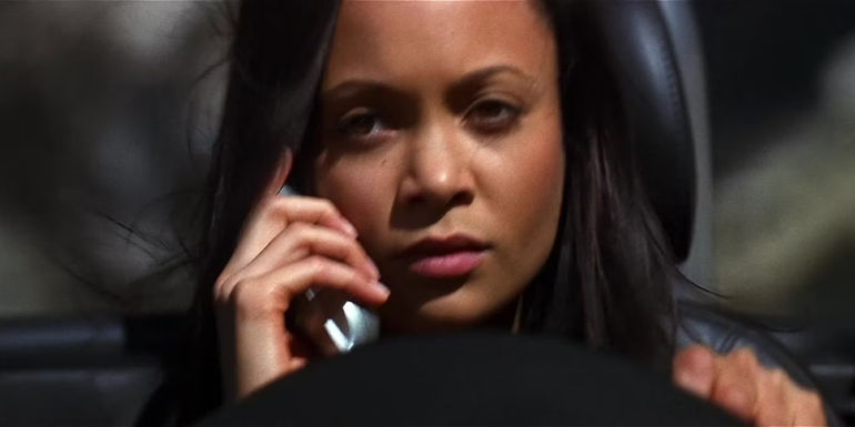 Thadiwe Newton on the phone while driving in Mission: Impossible II