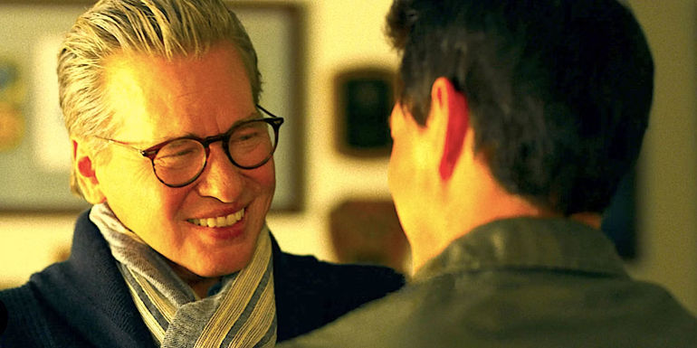 Iceman (Val Kilmer) and Maverick (Tom Cruise) talking during a heartwarming reunion in Top Gun: Maverick