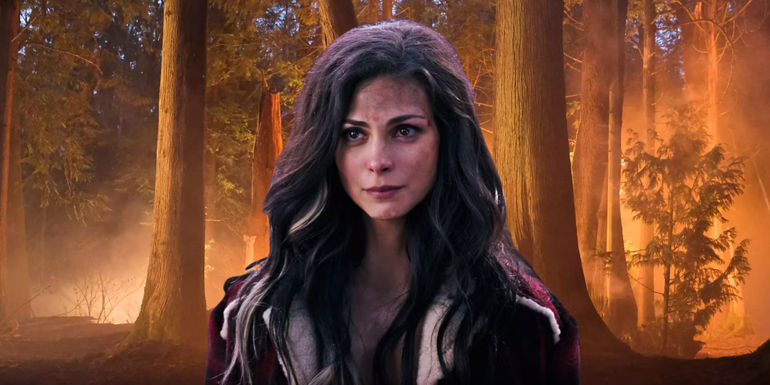 Morena Baccarin seen against a burning forest in Fire Country