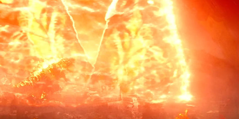 Godzilla in an explosion with Mothra.