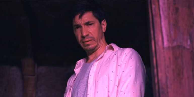 Justin Long's AJ frowns at a dark basement in Barbarian