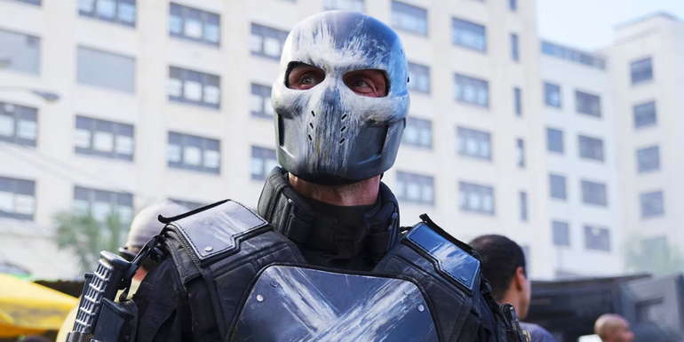 Brock Rumlow's Crossbones stand in a city street in Captain America Civil War