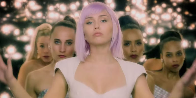 Miley Cyrus as Ashley O performing a song in Black Mirror