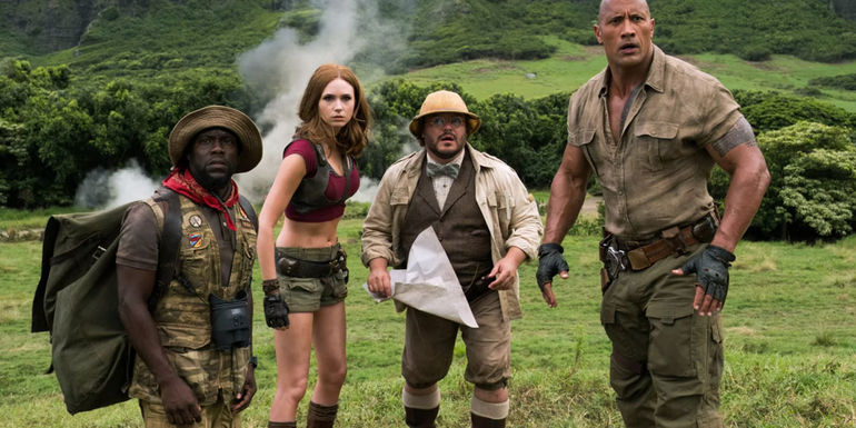 The players in a field in Jumanji Welcome to the Jungle