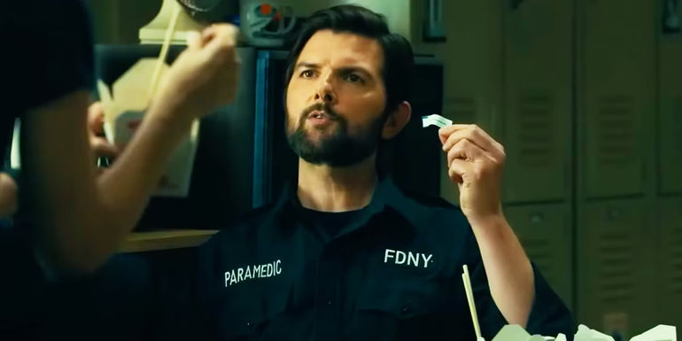 Ben Parker reading a fortune cookie in Madame Web