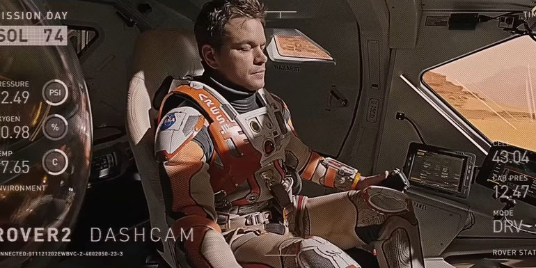 Mark Watney (Matt Damon) closing his eyes while driving the rover in The Martian.
