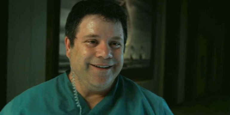 Bob Newby (Sean Astin) smiling in Stranger Things