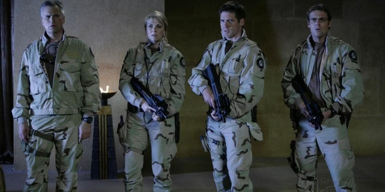 The main cast of Stargate Continuum in uniform with guns - Straight-To-Video Film Released In 2008 - Stargate: Continuum
