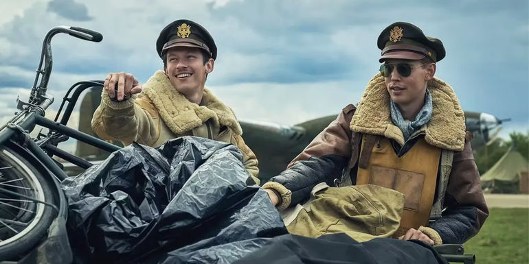 Image: Austin Butler as Major Gale Cleven and Callum Turner as Major John Egan with a bike in Masters of the Air