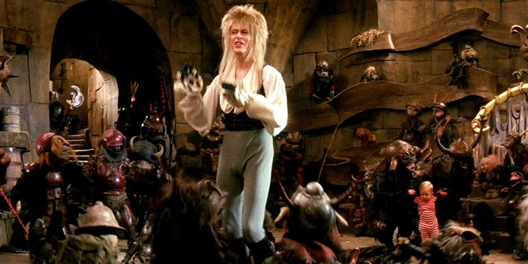 David Bowie as Jareth dancing on the table in Labyrinth - What Will Happen In The Sequel? - Labyrinth 2 Story