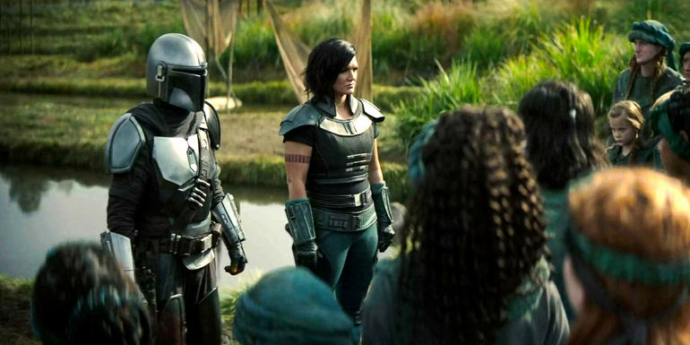 Din Djarin and Cara Dune talk to the Sorgan villagers in The Mandalorian season 1 episode 4 - Sorgan Is Din Djarin's And Grogu's Sanctuary