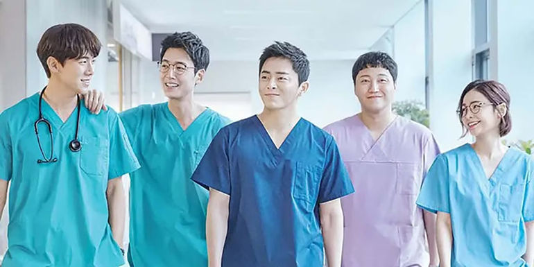 The main cast members from Hospital Playlist in scrubs