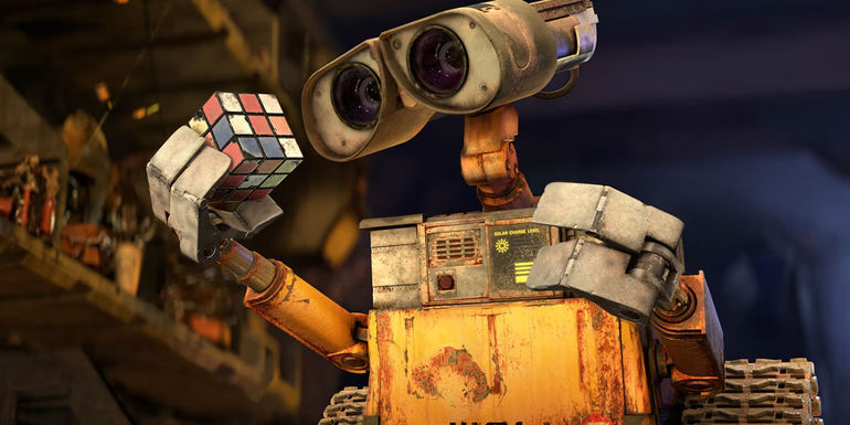 An image of WALL-E holding a rubik cube in the movie - Could Pixar Change Their Minds About WALL-E 2?