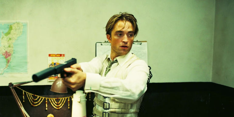 Robert Pattinson as Neil in Tenet