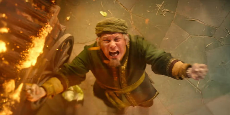 The Cabbage Man screaming next to his burning cabbages in Netflix's The Last Airbender