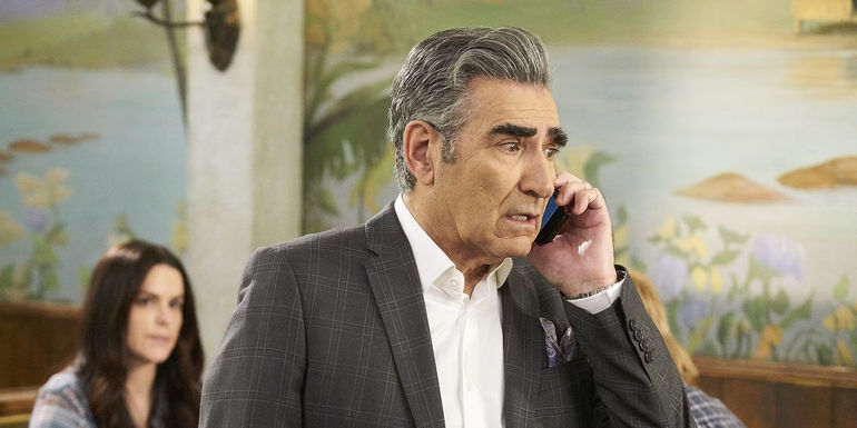 Eugene Levy as Johnny Rose talking on the phone in Schitt's Creek