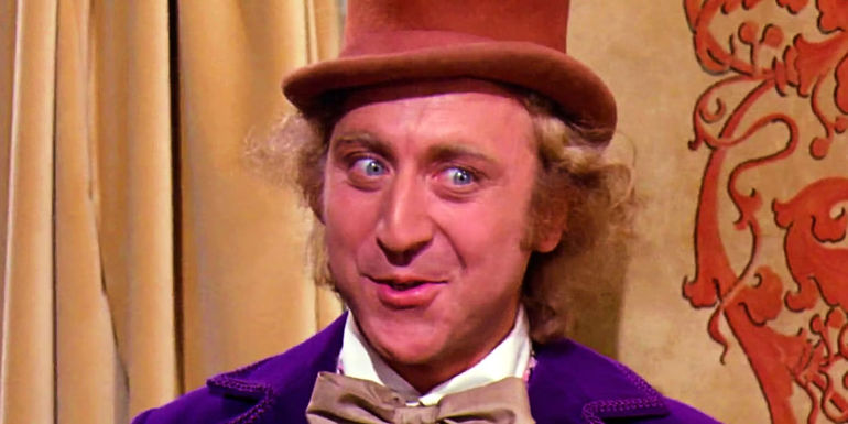 Willy Wonka (Gene Wilder) speaking mischievously in Willy Wonka and the Chocolate Factory - Directed by Mel Stuart - Willy Wonka and the Chocolate Factory (1971)