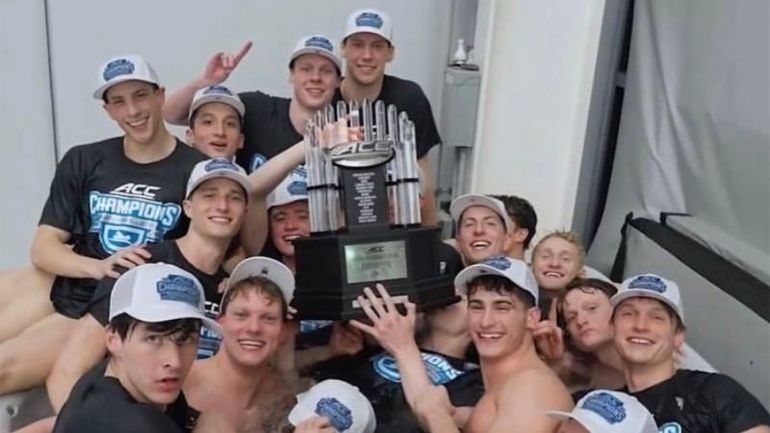 Controversial Disqualification in College Swimming: Title Stripped for Celebrating with Teammate