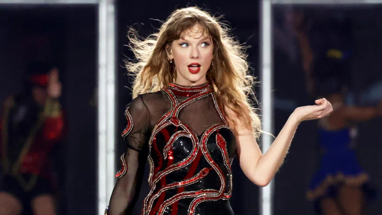 Taylor Swift Playfully Teases About Humidity Resetting Her Hair at Singapore Show