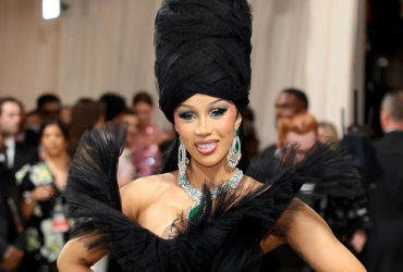 Cardi B Stuns in a Dramatic Black Gown Dominating the Red Carpet at the 2024 Met Gala