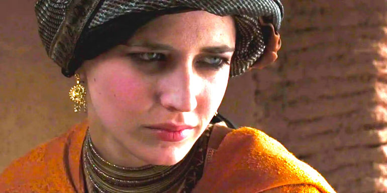 Eva Green wearing a turban and gazing downward in Kingdom of Heaven