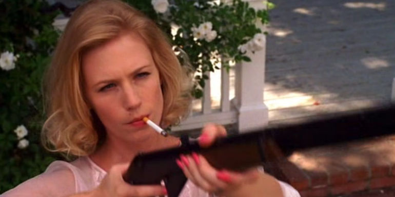 Betty with a gun in Mad Men