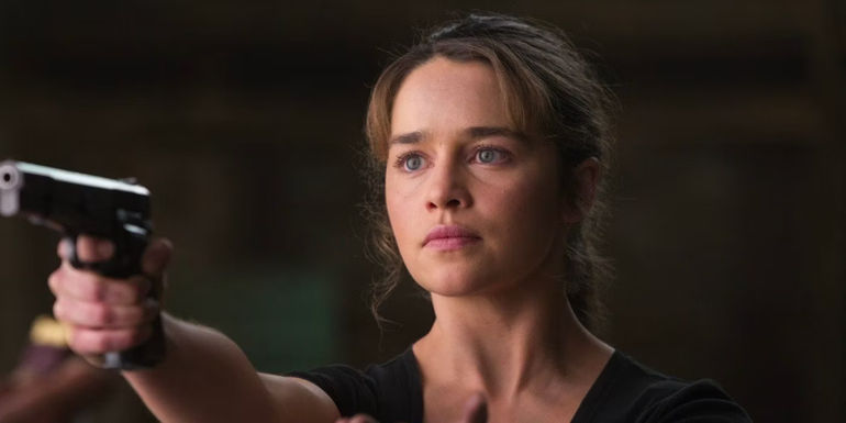 Emilia Clarke pointing gun