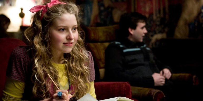 Jessie Cave writing in notebook in Harry Potter and the Half-Blood Prince