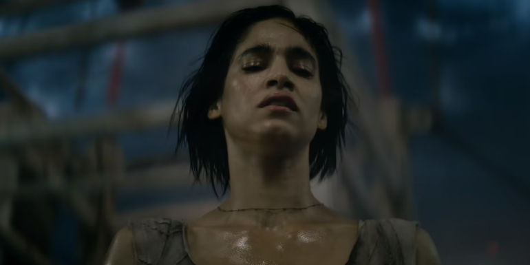 Kora watches Noble fall in Rebel Moon.