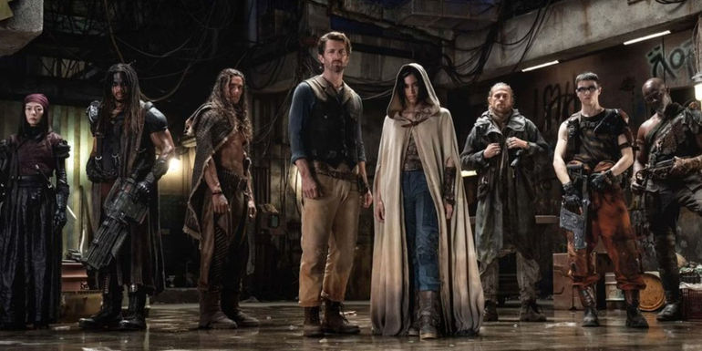 The cast of Rebel Moon all standing next to one another