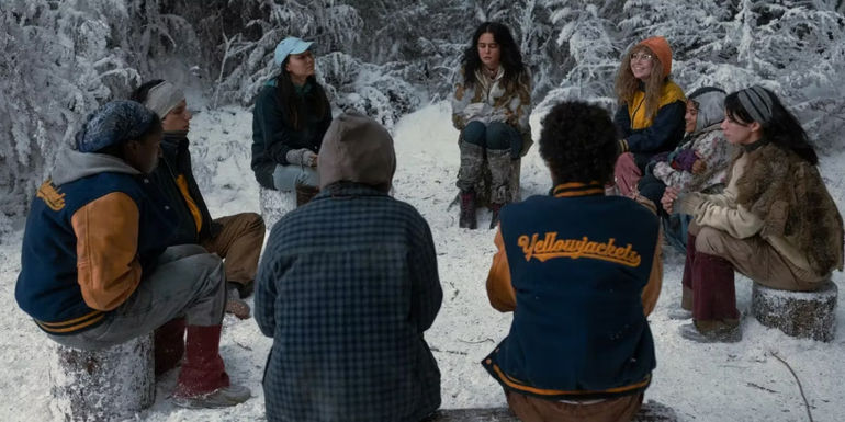 The Yellowjackets sitting in the snow