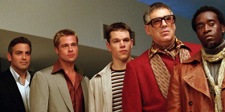 George Clooney, Brad Pitt, Matt Damon, Elliot Gould, and Don Cheadle in a row in Ocean's 11.