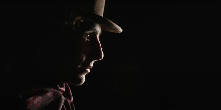 Timothee Chalamet in dark lighting in Wonka