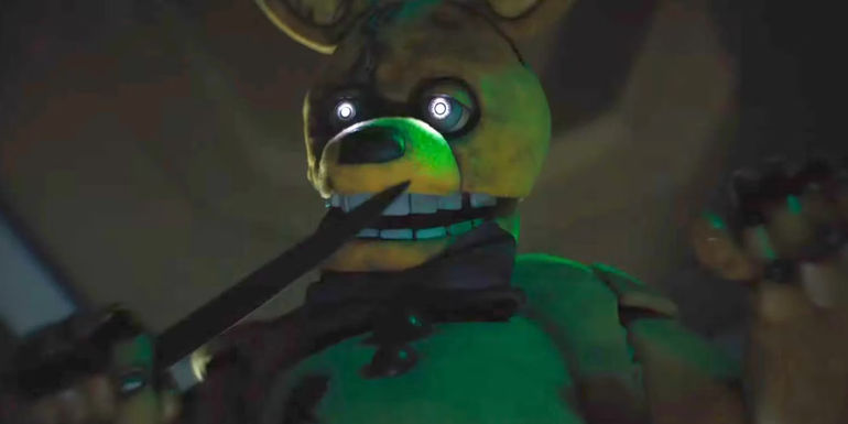 Spring Bonnie holds up a knife in the Five Nights at Freddy's movie.